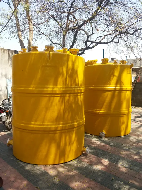 Yellow vertical PP storage tanks