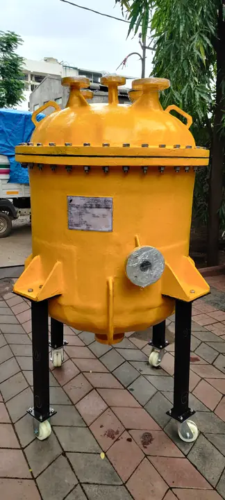 A yellow vacuum receiver on legs